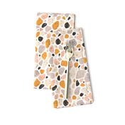 Terrazzo grey, orange and pink pebbles seamless pattern