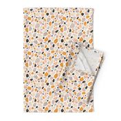 Terrazzo grey, orange and pink pebbles seamless pattern