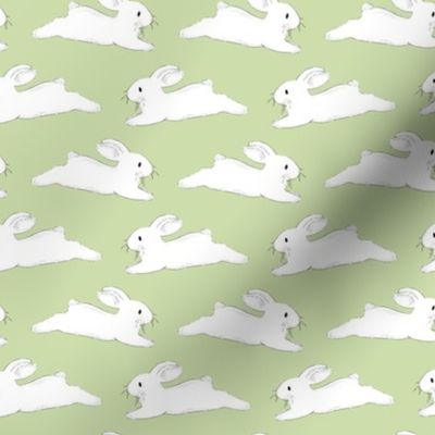 Leaping White Bunnies on Green