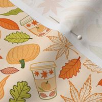 Autumn leaves, pumpkins and coffee cups