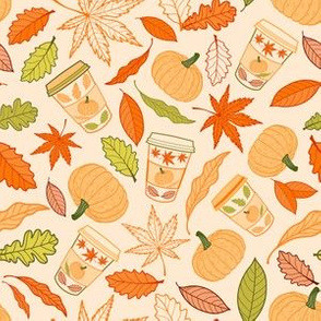 Autumn leaves, pumpkins and coffee cups