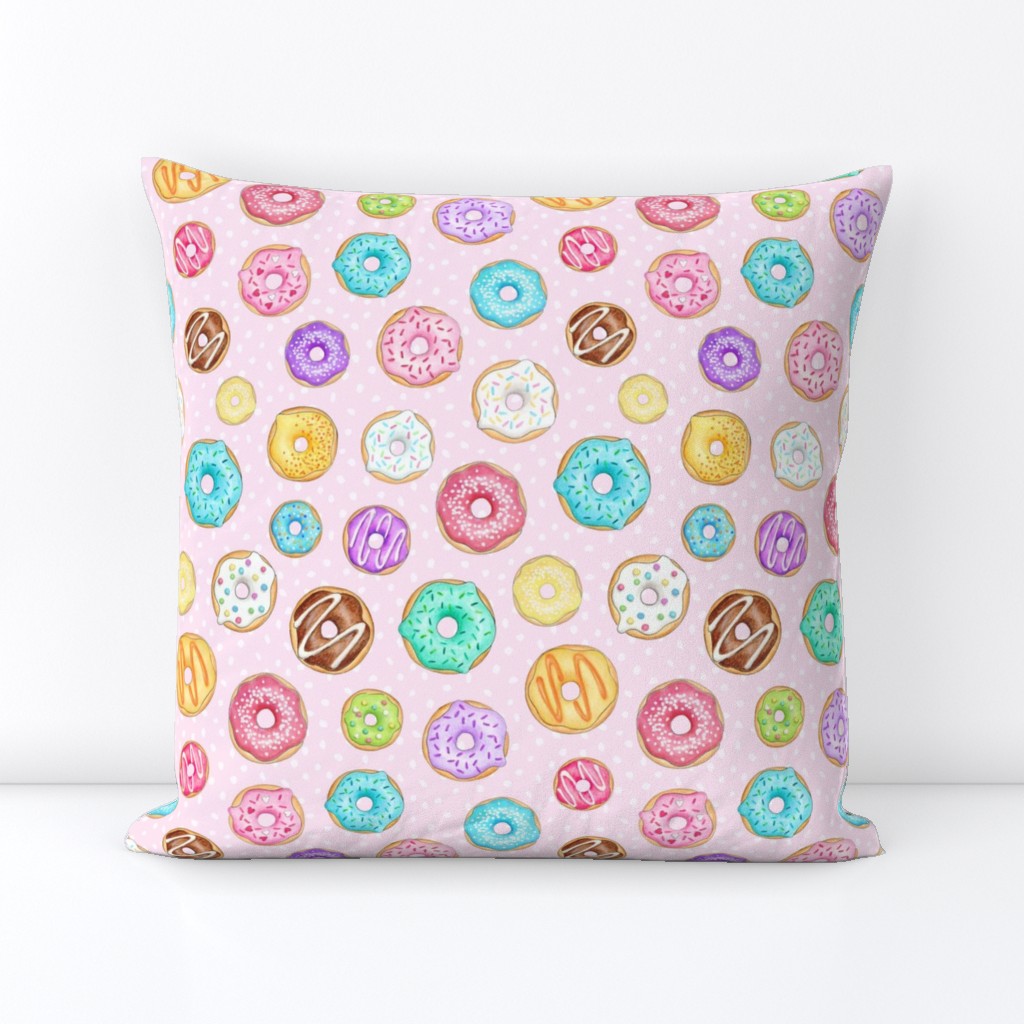 Scattered Rainbow Donuts on pale pink spotty - medium scale