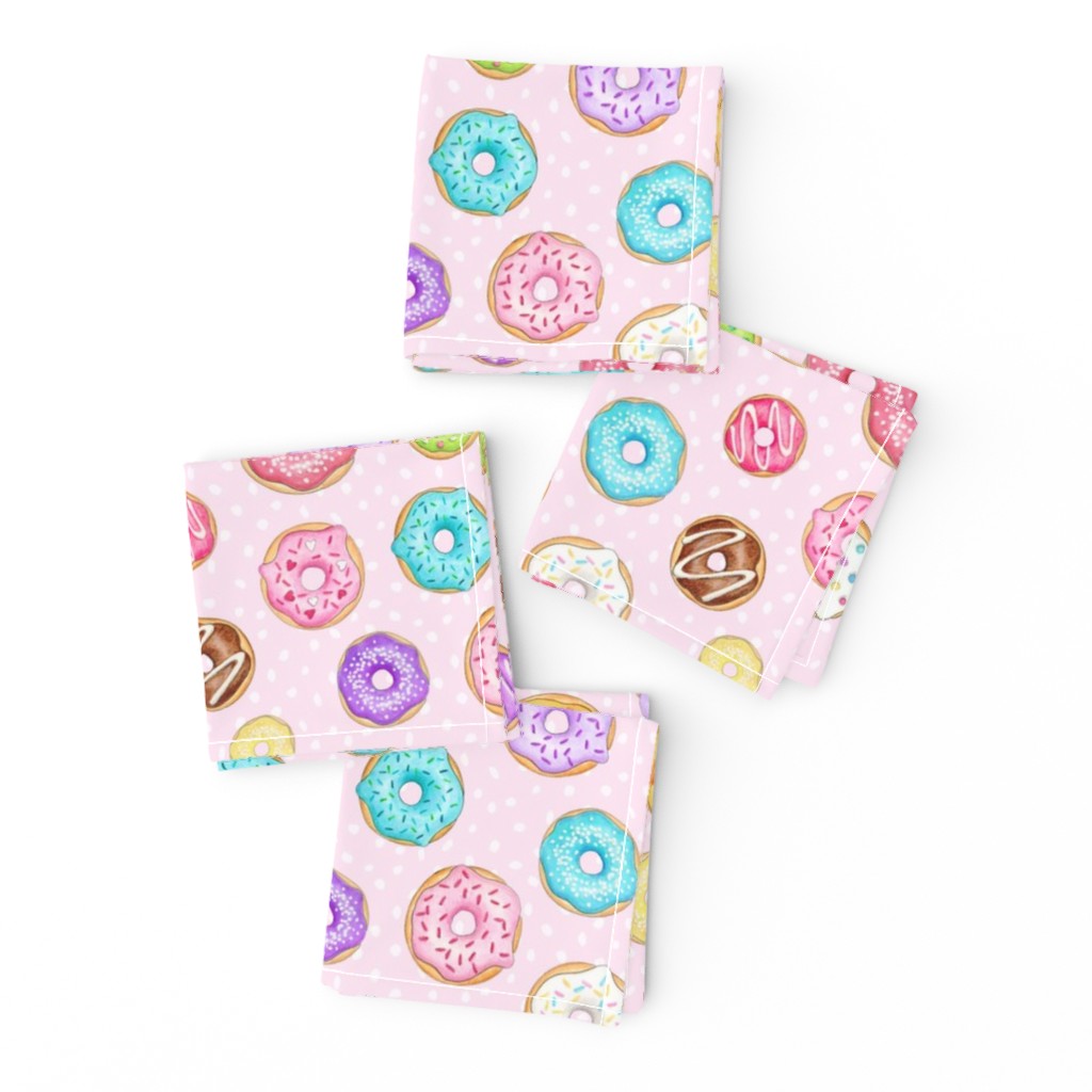 Scattered Rainbow Donuts on pale pink spotty - medium scale