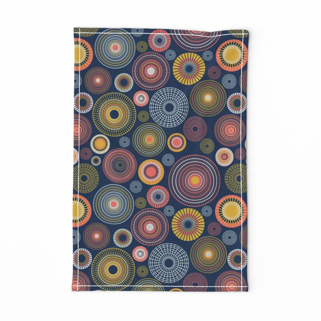 colorful concentric circles on dark blue | medium