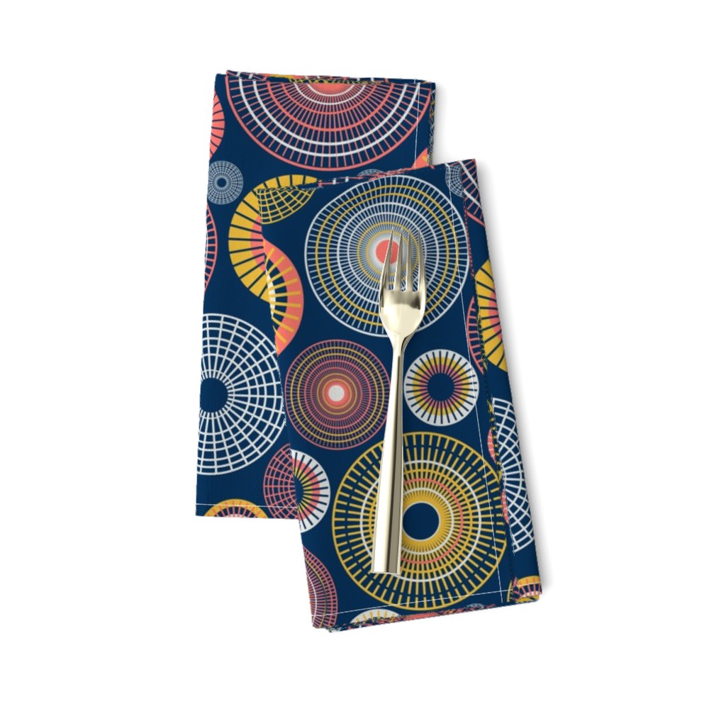 colorful concentric circles on dark blue | medium