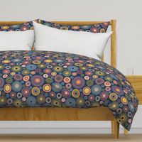 colorful concentric circles on dark blue | medium