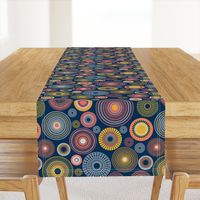 colorful concentric circles on dark blue | medium