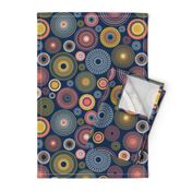 colorful concentric circles on dark blue | medium