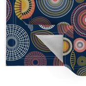 colorful concentric circles on dark blue | medium