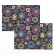 colorful concentric circles on dark blue | medium