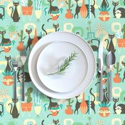 modern cats and plants in teal