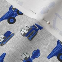 (1" scale) construction trucks - blue on grey linen C19BS