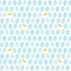 blue pysanky - colored eggs - in horizontal rows with little chickens