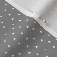 Tiny Triangles on Gray