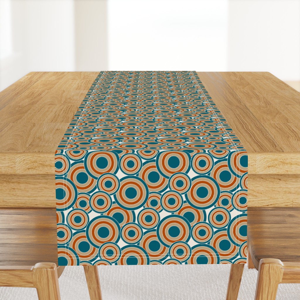 concentric circles teal, burnt orange, tan, cream