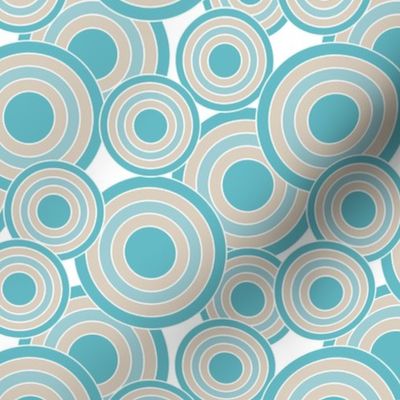 concentric circles in turquoise, sand and white