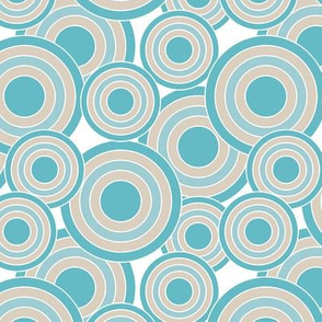 concentric circles in turquoise, sand and white