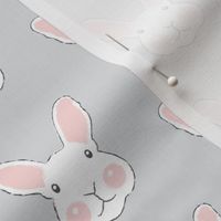 realistic bunnies on light grey