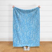 large grungy texture in blue on white