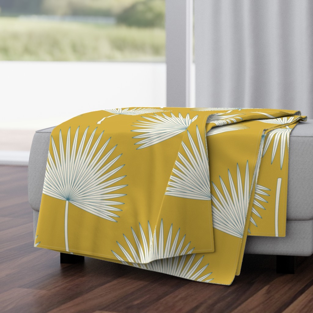 Boho sunshine palm leaves on mustard green