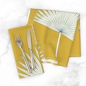 Boho sunshine palm leaves on mustard green