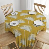 Boho sunshine palm leaves on mustard green