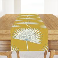 Boho sunshine palm leaves on mustard green