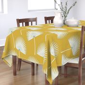 Boho sunshine palm leaves on mustard green