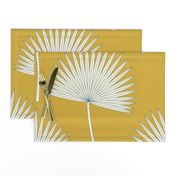 Boho sunshine palm leaves on mustard green