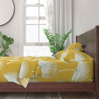 Boho sunshine palm leaves on mustard green