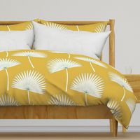 Boho sunshine palm leaves on mustard green