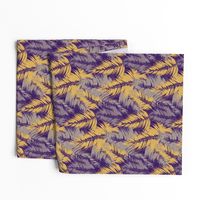 tropical palm leaves on purple