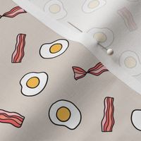 Fried eggs and bacon breakfast food pattern