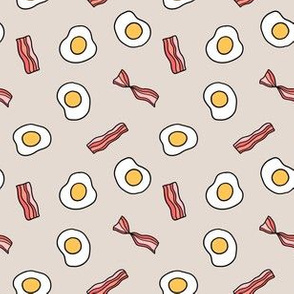 Fried eggs and bacon breakfast food pattern