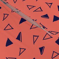 Tumbling Triangles - navy on coral