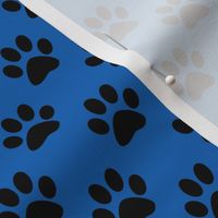 One Inch Black Paw Prints on Turquoise Blue