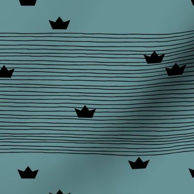 Floating on water little paper boats and abstract water waves stripes monochrome black and blue winter