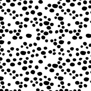 Minimal confetti cat dots on trend abstract animal print texture spots black and white monochrome