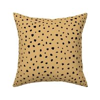 Little spots and speckles panther animal skin abstract minimal dots in mustard yellow