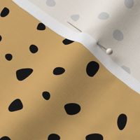 Little spots and speckles panther animal skin abstract minimal dots in mustard yellow