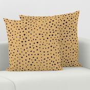 Little spots and speckles panther animal skin abstract minimal dots in mustard yellow