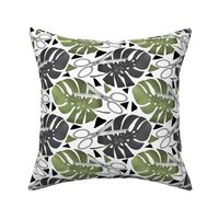 Tropical print monstera leaves and scissors