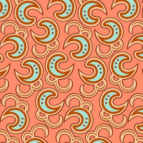 Heavenly colored crescent moons on orange background