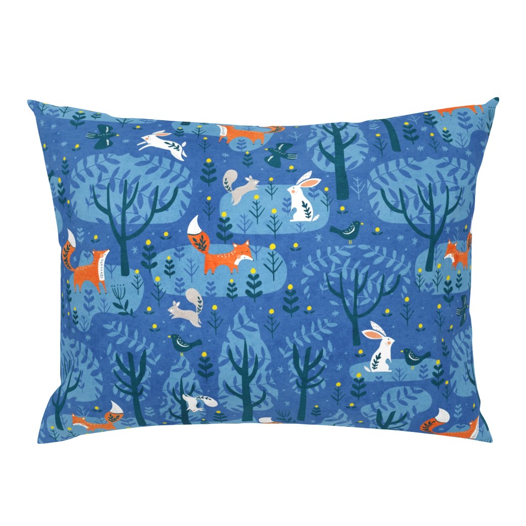 Foxes in the emerald forest in blue