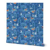 Foxes in the emerald forest in blue