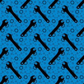 Adjustable Wrenches & Nuts on Blue