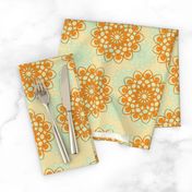 Orange and light blue stylized flowers on beige background