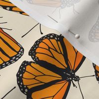 Monarchs on cream  9”