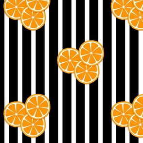 orange slices on black and white stripes
