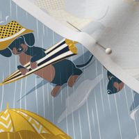 Small scale // Ready For a Rainy Walk // pastel blue background navy blue dachshunds dogs with yellow and transparent rain coats and umbrellas 